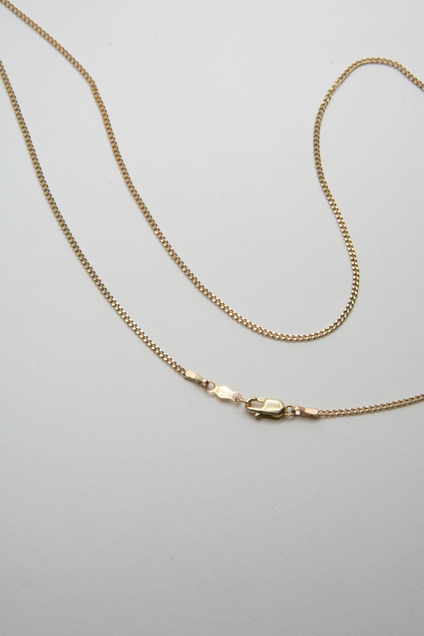 Solid 14k gold curbed chain necklace handmade in Asheville, NC.