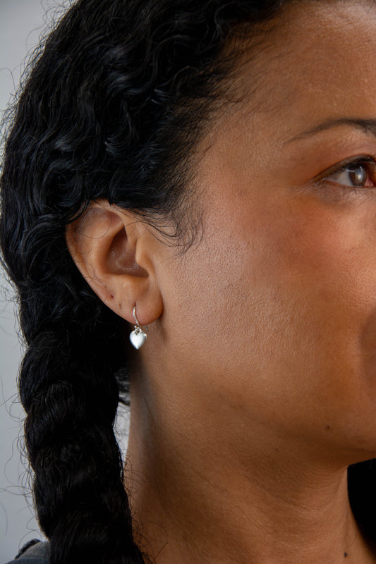 Solid sterling silver 925 heart earrings handmade in Asheville, NC.