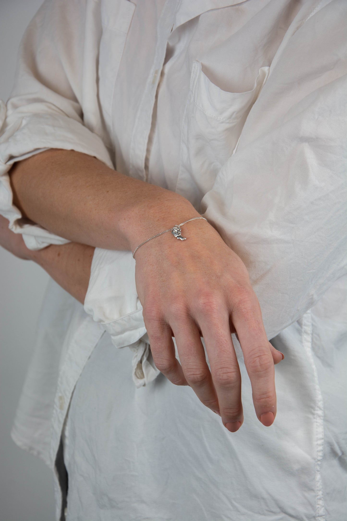 Solid sterling silver 925 curbed chain Hermes charm bracelet handmade in Asheville, NC.