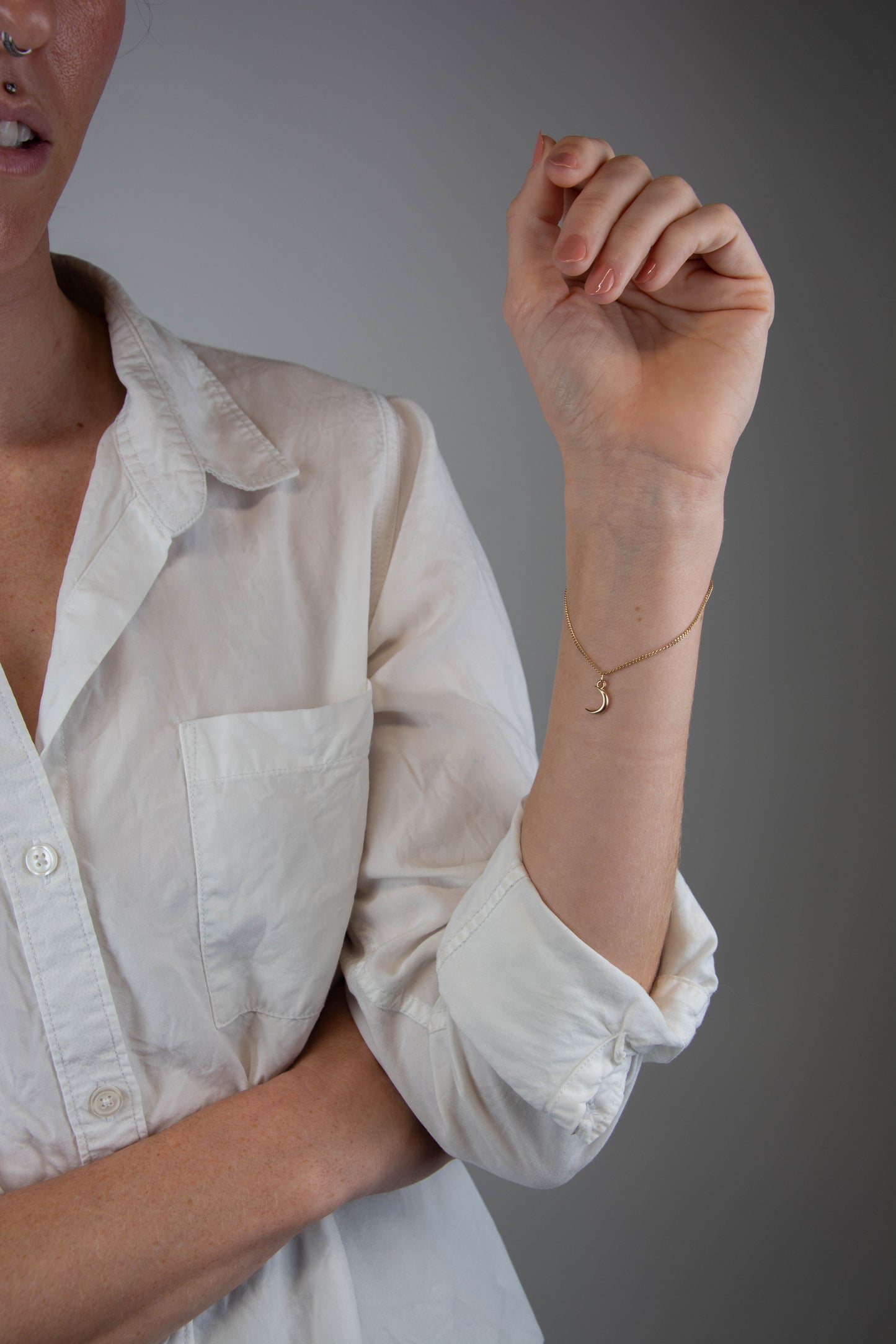 Solid 14k gold curbed chain moon charm bracelet handmade in Asheville, NC.