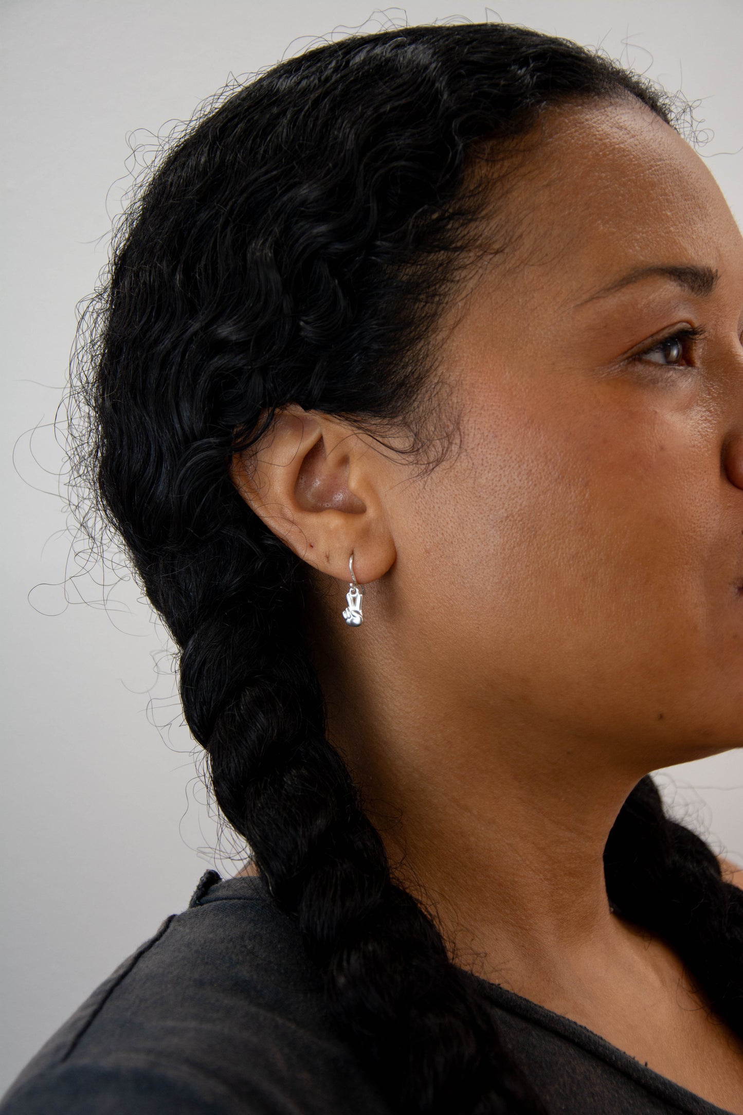 Solid sterling silver 925 peace sign earrings handmade in Asheville, NC.