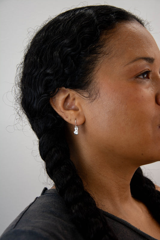 Solid sterling silver 925 peace sign earrings handmade in Asheville, NC.