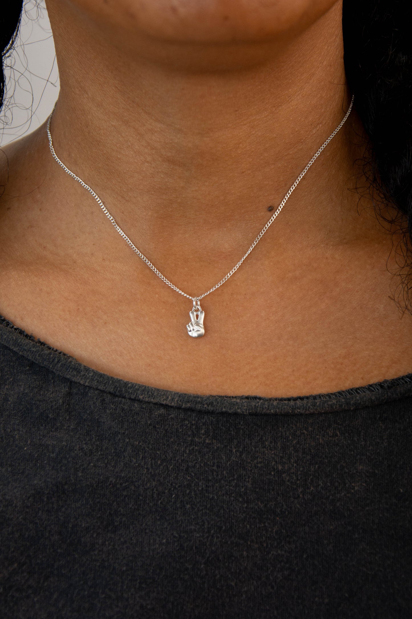 Solid sterling silver 925 peace sign charm necklace handmade in Asheville NC.