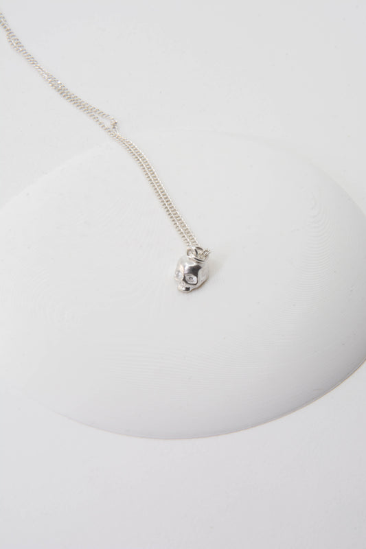Solid sterling silver 925 skull charm necklace handmade in Asheville NC.