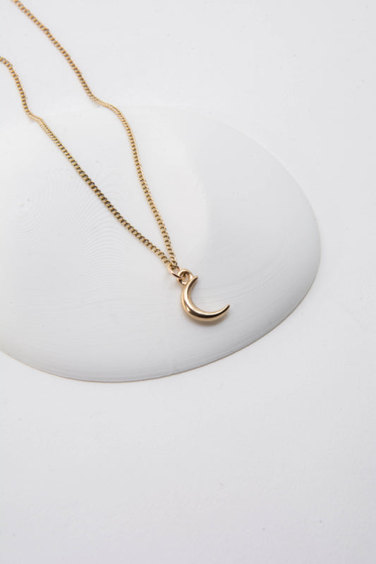 Solid 14k crescent moon charm necklace handmade in Asheville, NC.