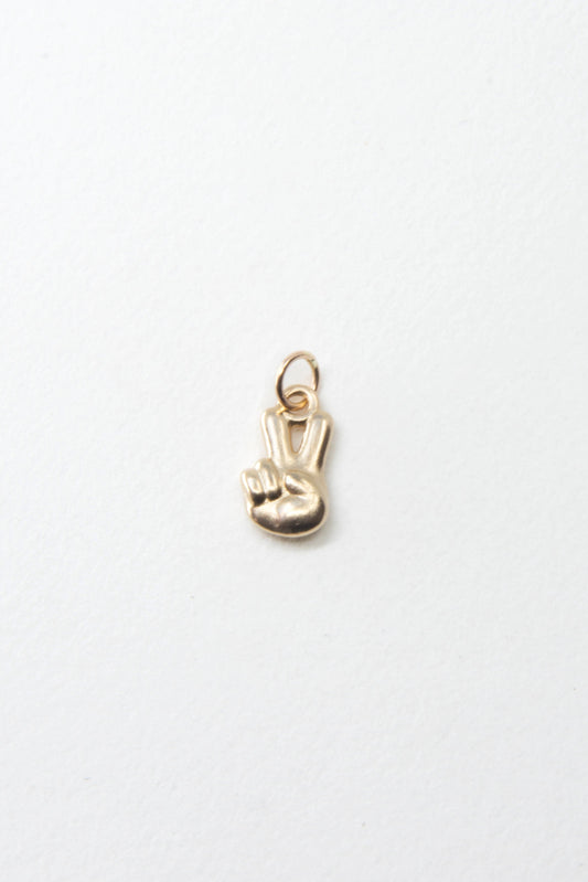 Solid 14k peace sign charm handmade in Asheville, NC.