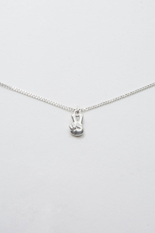 Solid sterling silver 925 peace sign charm necklace handmade in Asheville NC. 